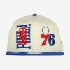 NEW ERA NBA PHILADELPHIA 76ERS DRAFT 9FIFTY SNAPBACK CAP CREAM/ROYAL BLUE