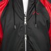 JORDAN ESSENTIALS WOVEN JACKET BLACK/GYM RED